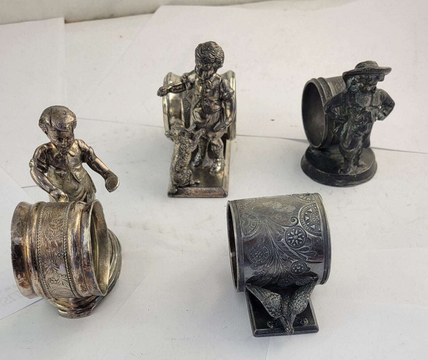 4 Victorian Figural Silver Plate Napkin Ring Holders Eagle. Boy Dog, Girl Child