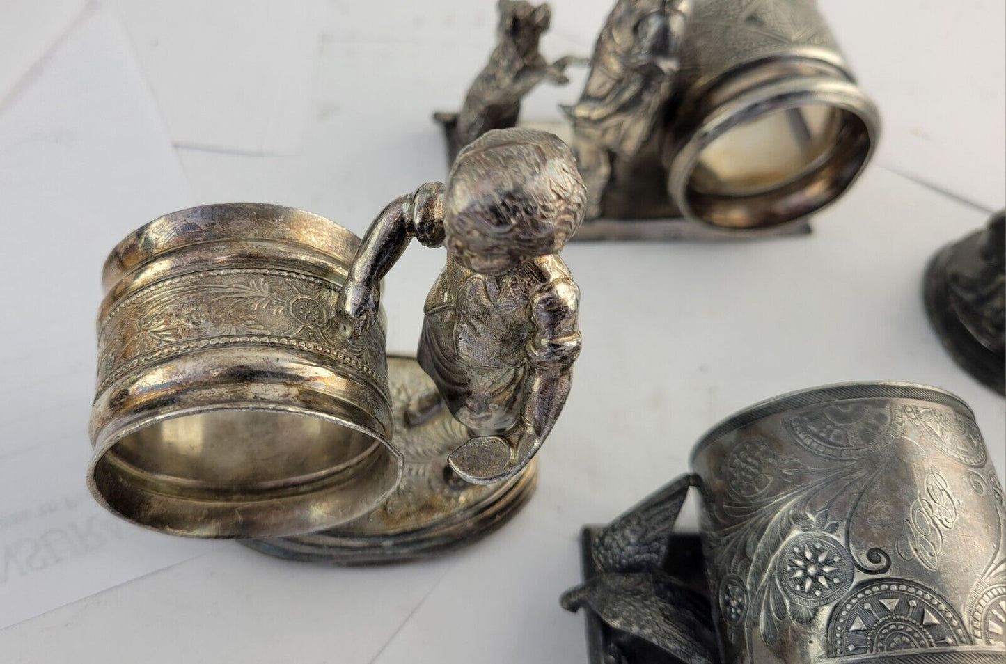 4 Victorian Figural Silver Plate Napkin Ring Holders Eagle. Boy Dog, Girl Child