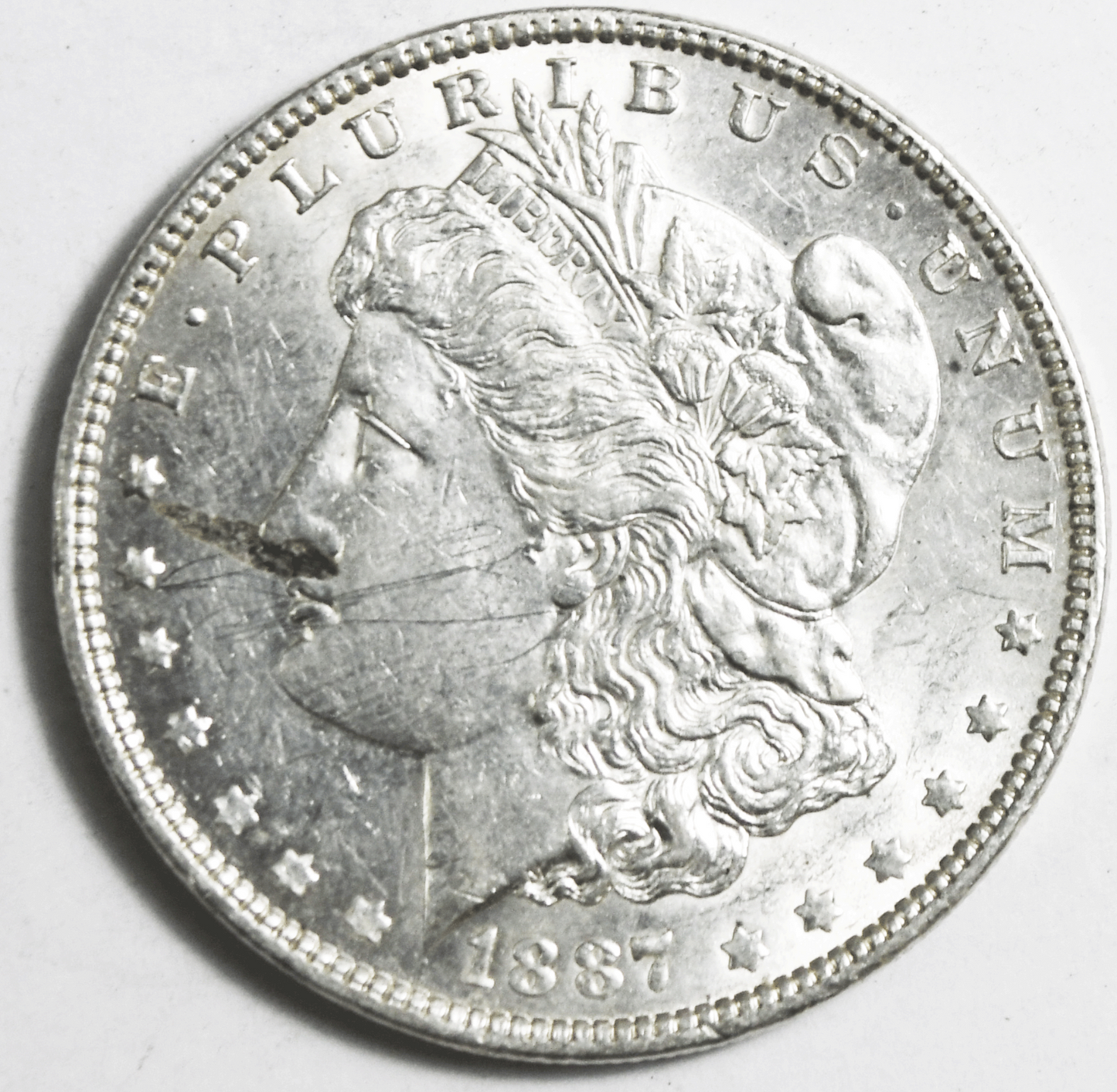 1887 $1 Morgan American Silver One Dollar Philadelphia AU Scratches Lamination