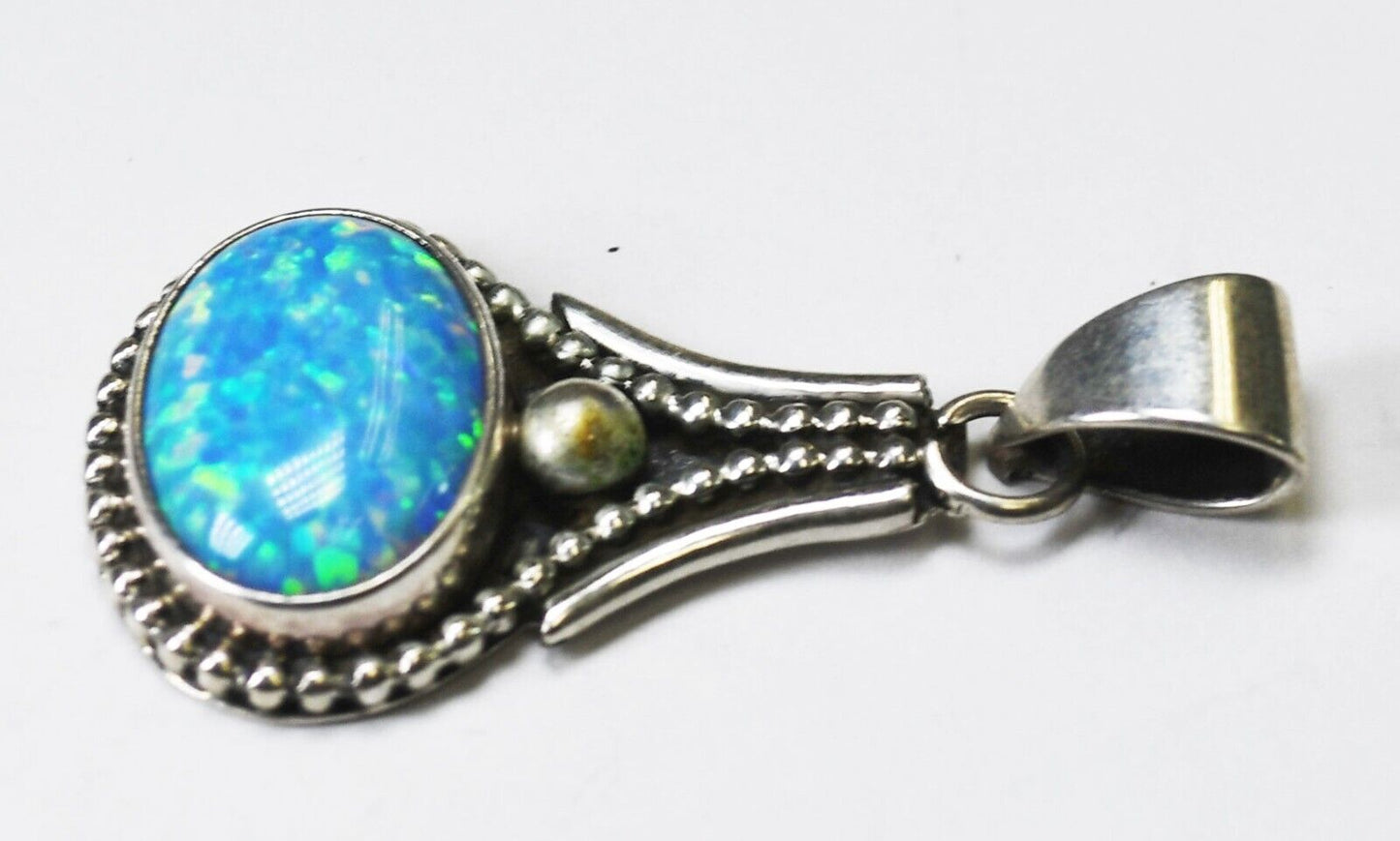 Sterling Silver Desert Rose Trading Blue Simulated Opal Pendant 35mm x 17mm