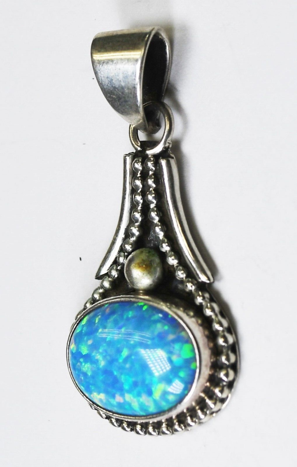 Sterling Silver Desert Rose Trading Blue Simulated Opal Pendant 35mm x 17mm