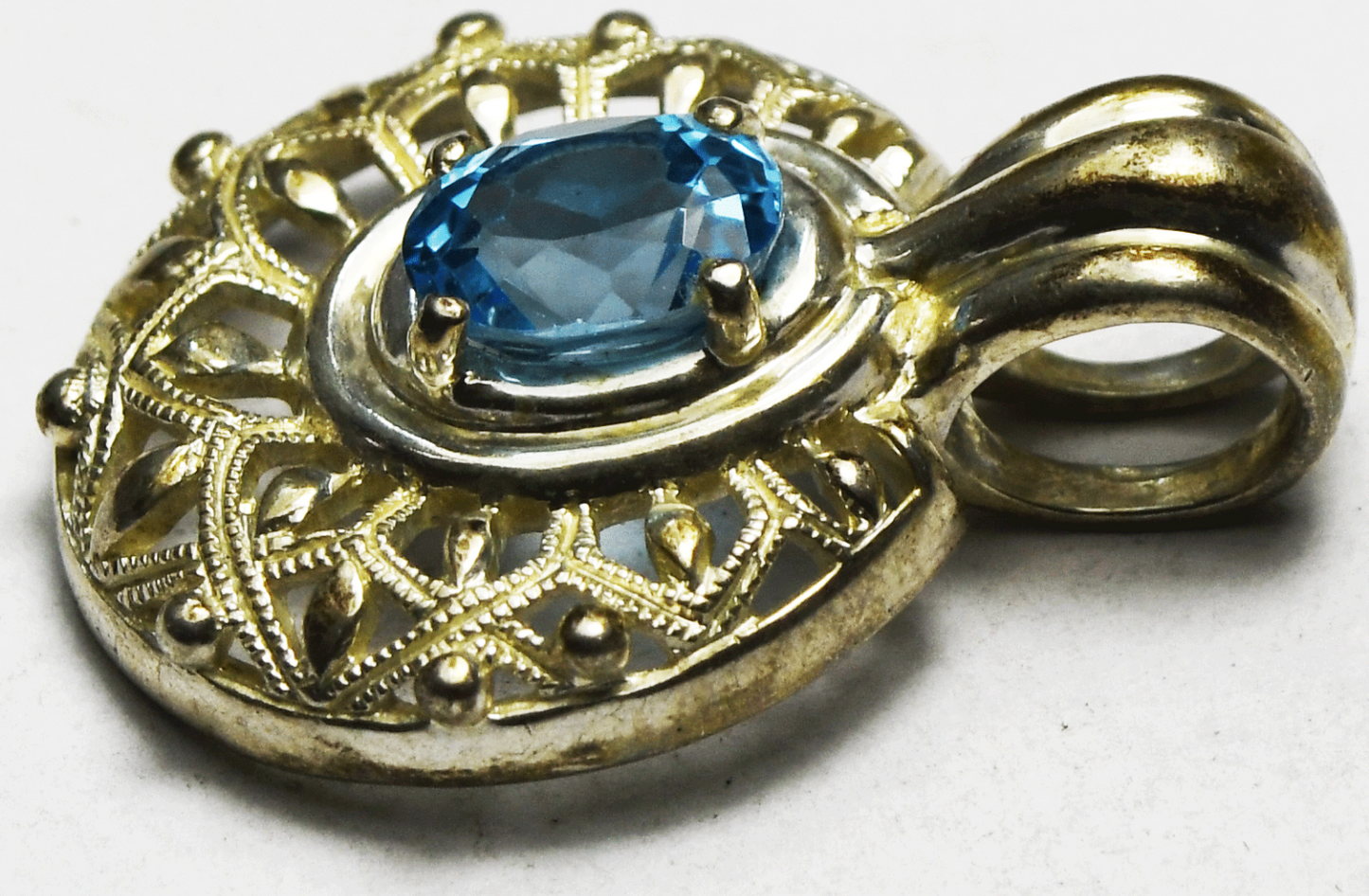 Sterling Silver Oval Blue Topaz Filigree Round Pendant 31mm x 23mm