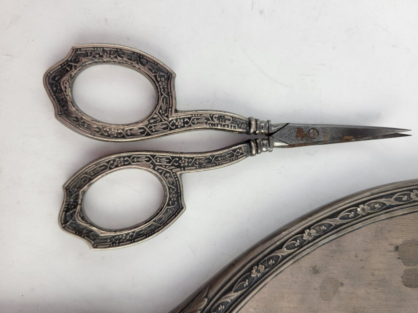 Victorian Sterling Repousse 5 Piece Vanity Set Mirror scissors Nail Buffer