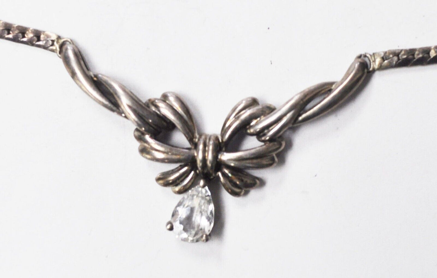 Sterling Silver Teardrop 26mm Bow CZ 3mm Flat Cobra Chain Necklace 18"