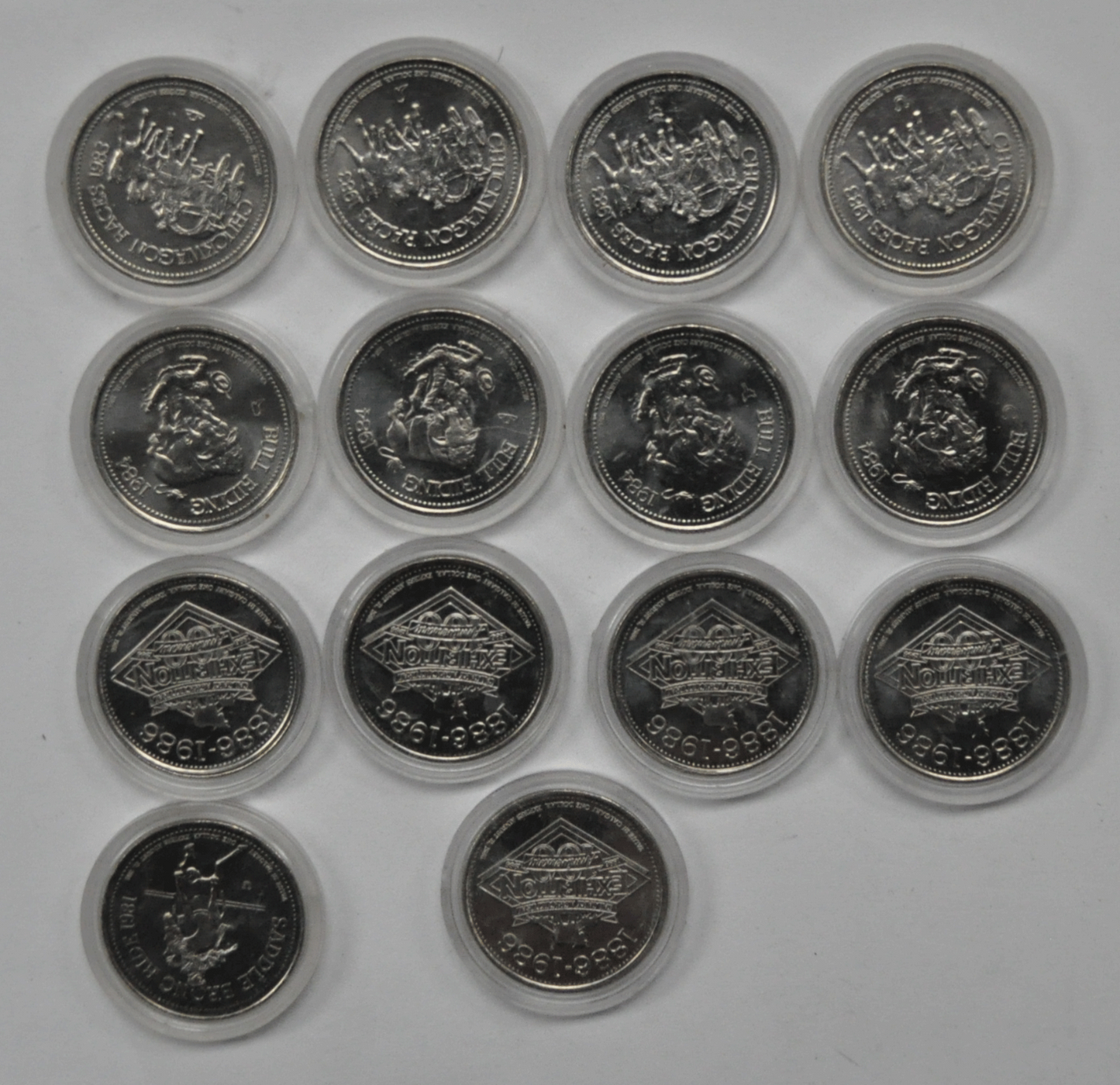 14 Calgary Stampede Dollars 1981 1983 1984 & 1986 Bull Riding Bronc Ride
