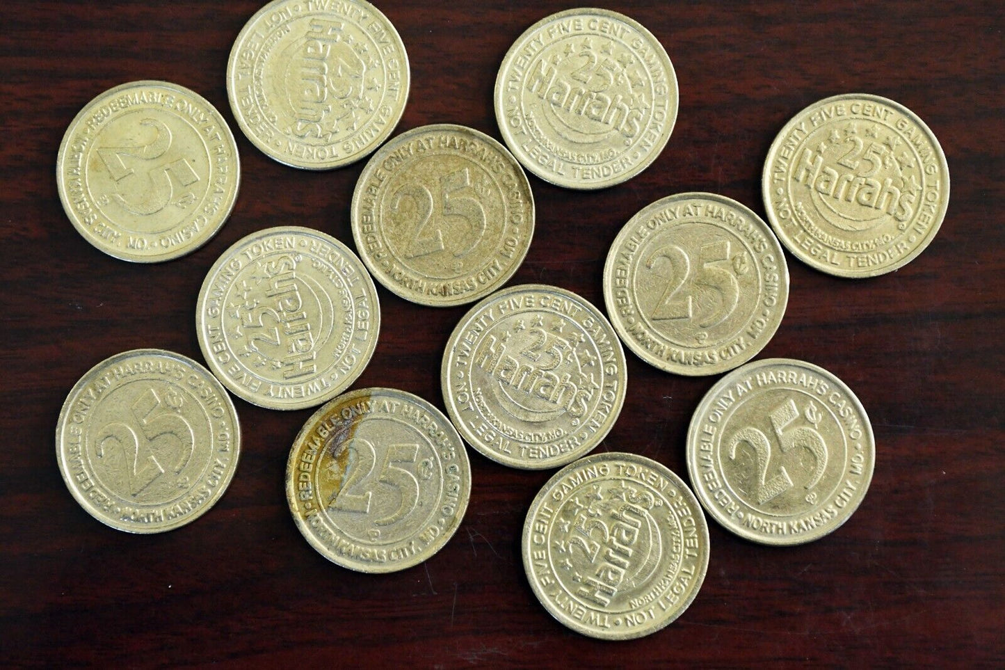 (12) Harrah's Casino Twenty Five Cent Slot Gaming Tokens North Kansas City