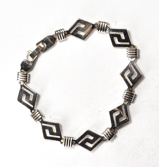 Sterling Silver Diamond Link Hockey Stick Cutout Twist 12mm Bracelet  7-1/2"