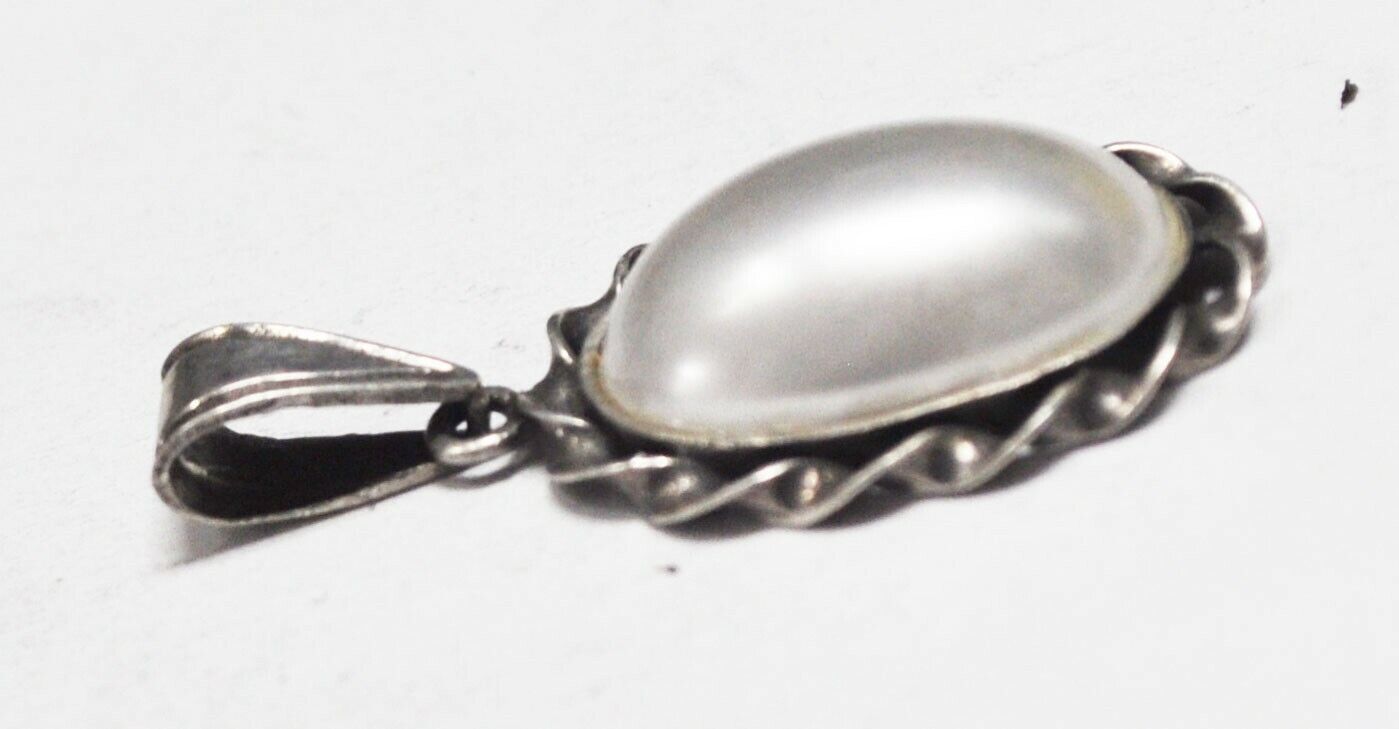 Sterling Silver Oval Pearl Pendant Twist Halo 39mm x 20mm