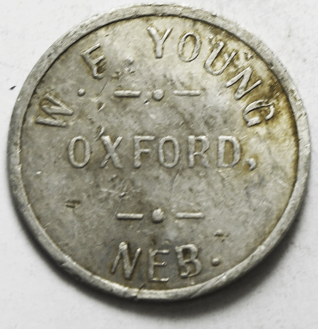 WF Young Oxford Nebraska Aluminum Trade Token 27mm