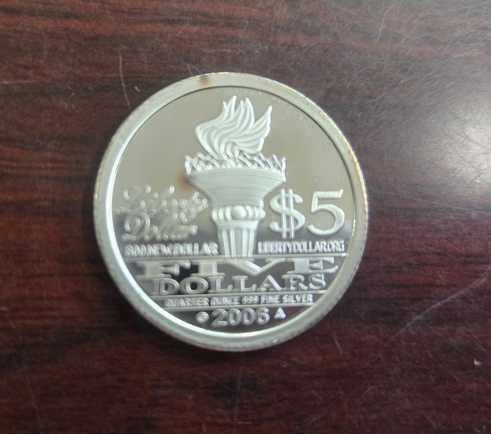 2006 NORFED $5 Silver. 999 Fine Liberty 1/4oz. Proof Like