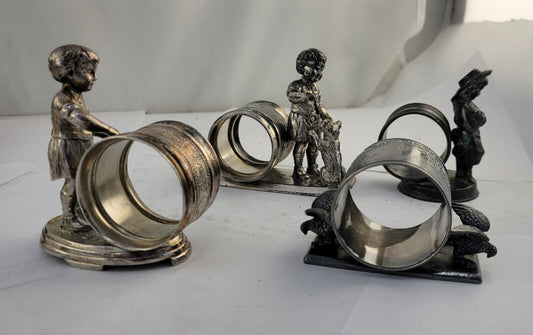 4 Victorian Figural Silver Plate Napkin Ring Holders Eagle. Boy Dog, Girl Child