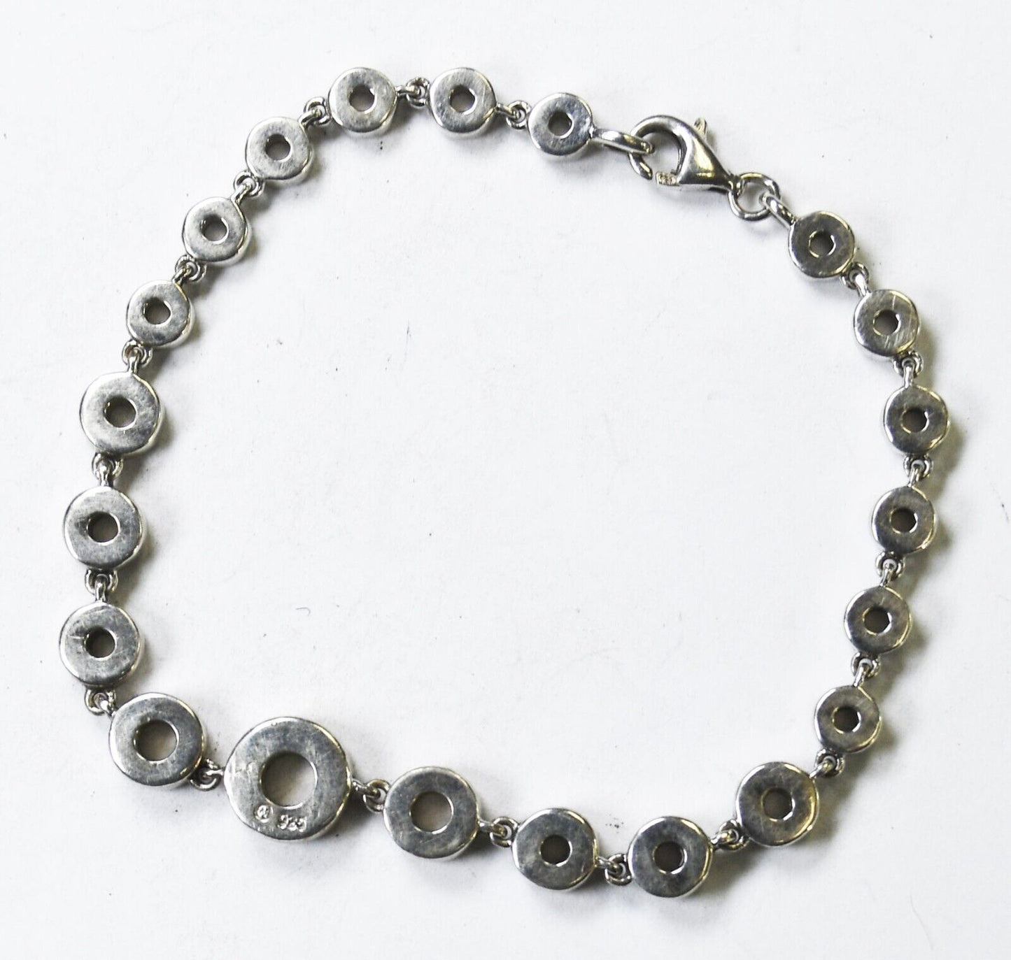 Sterling Silver Round Diamond Hoop 5mm-9mm Graduated Bracelet 7"
