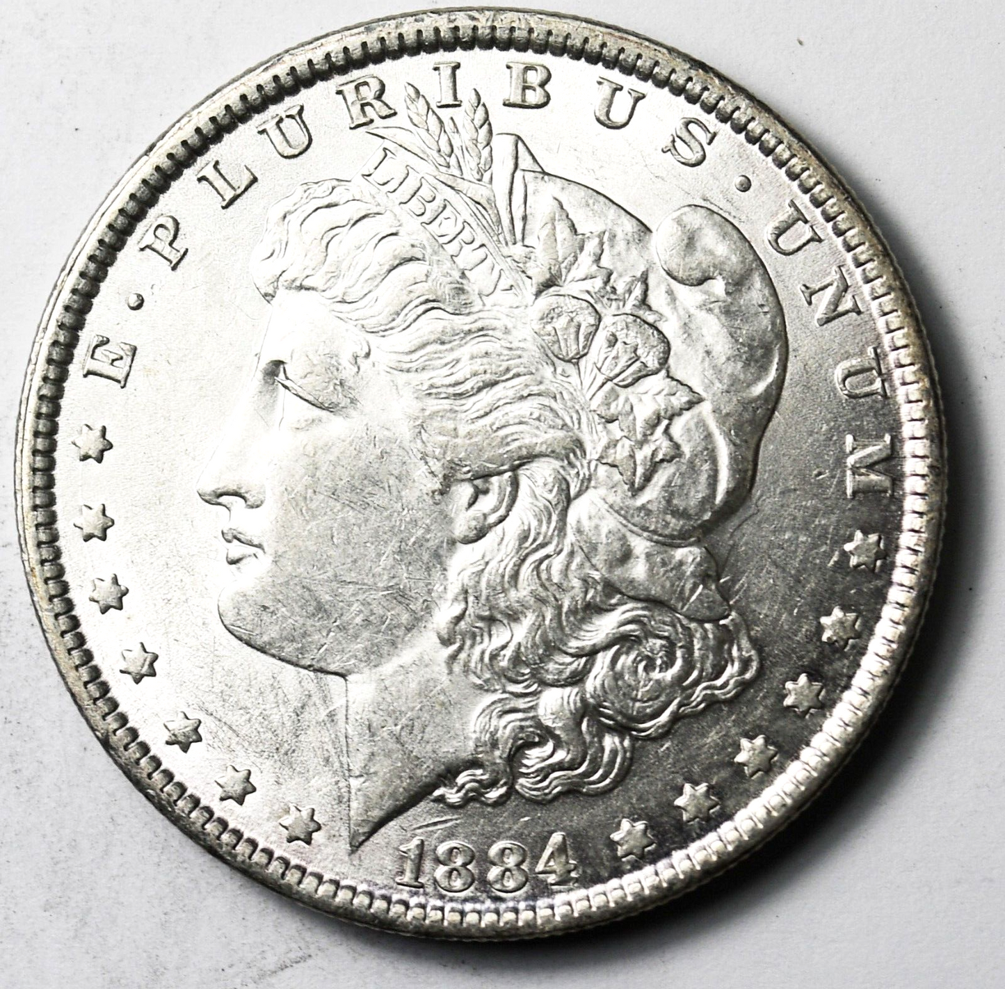 1884 $1 Morgan Silver One Dollar Philadelphia AU