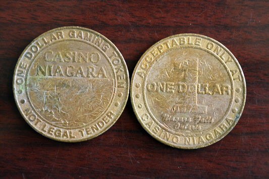 Set of 2 Casino Niagra Dollar Slot Tokens Niagra Falls Ontario Canada