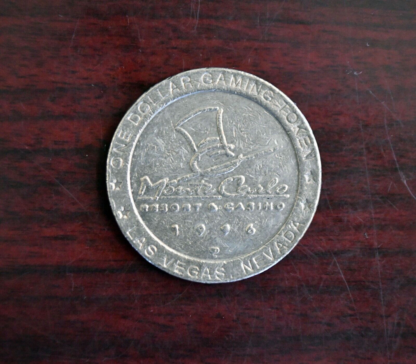 1996 Monte Carlo Resort Casino One Dollar Gaming Slot Token Las Vegas