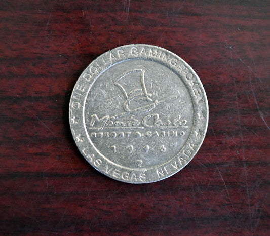 1996 Monte Carlo Resort Casino One Dollar Gaming Slot Token Las Vegas