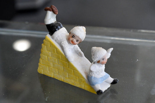 Porcelain German Bisque Figure Children Sliding 2 3/4" x 2 1/4" Winter