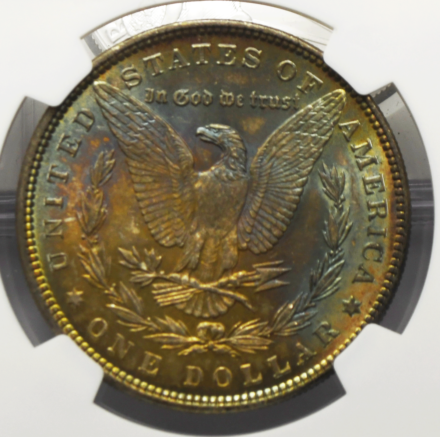 1885 $1 Morgan Silver Dollar MS64 NGC Uncirculated Philadelphia Rainbow Reverse