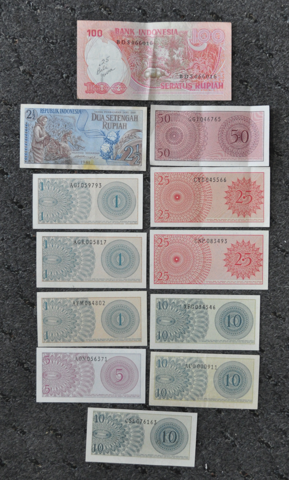 Lot of 12 Bank Indonesia 100 & 2-1/2 Rupiah 1 5 10 25 & 50 Sen Notes