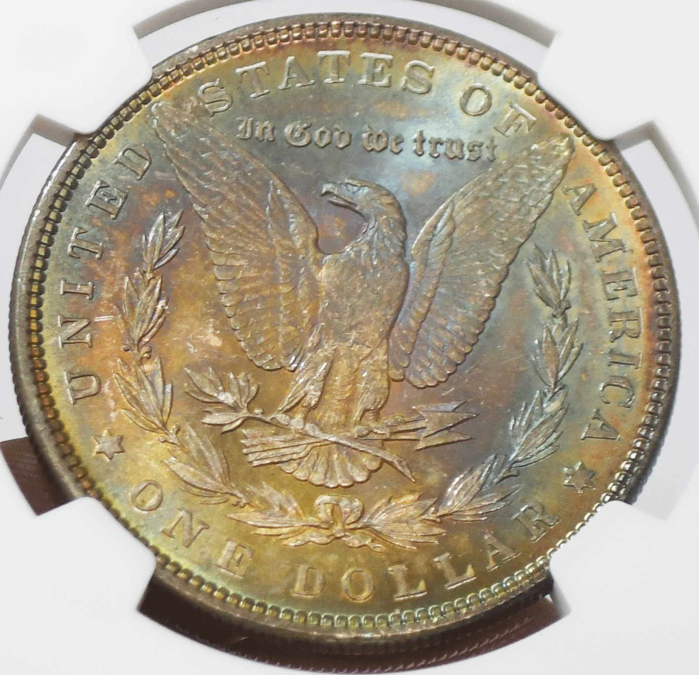 1885 $1 Morgan Silver Dollar MS64 NGC Uncirculated Philadelphia Rainbow Reverse