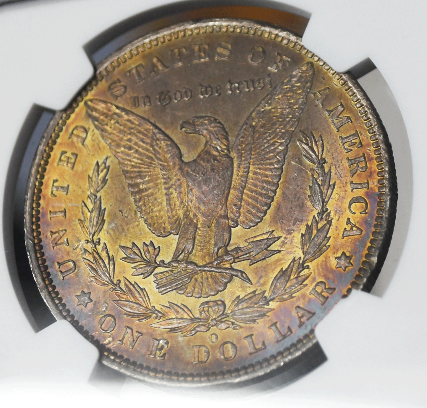 1885 O $1 Morgan Silver Dollar MS61 NGC Uncirculated Rainbow Toned