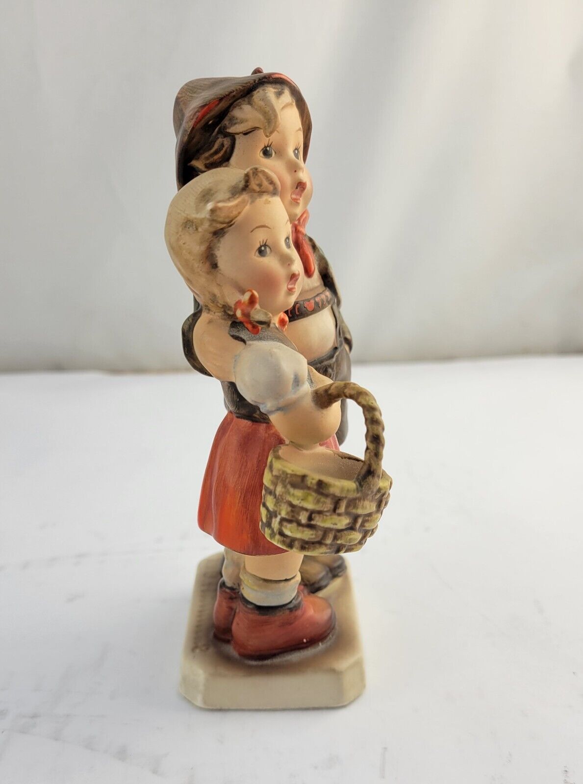 Hummel Goebel #94 /1 "Surprise" TMK-2 Boy & Girl holding Basket 1950-1959
