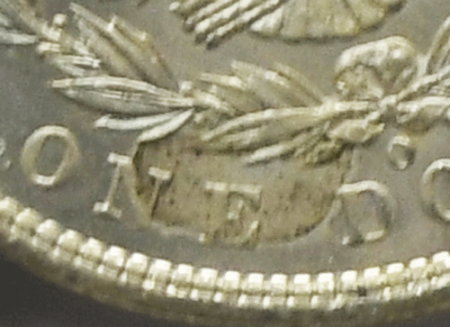 1904 O $1 Morgan Silver One Dollar MS63 NGC Lamination Error Reverse