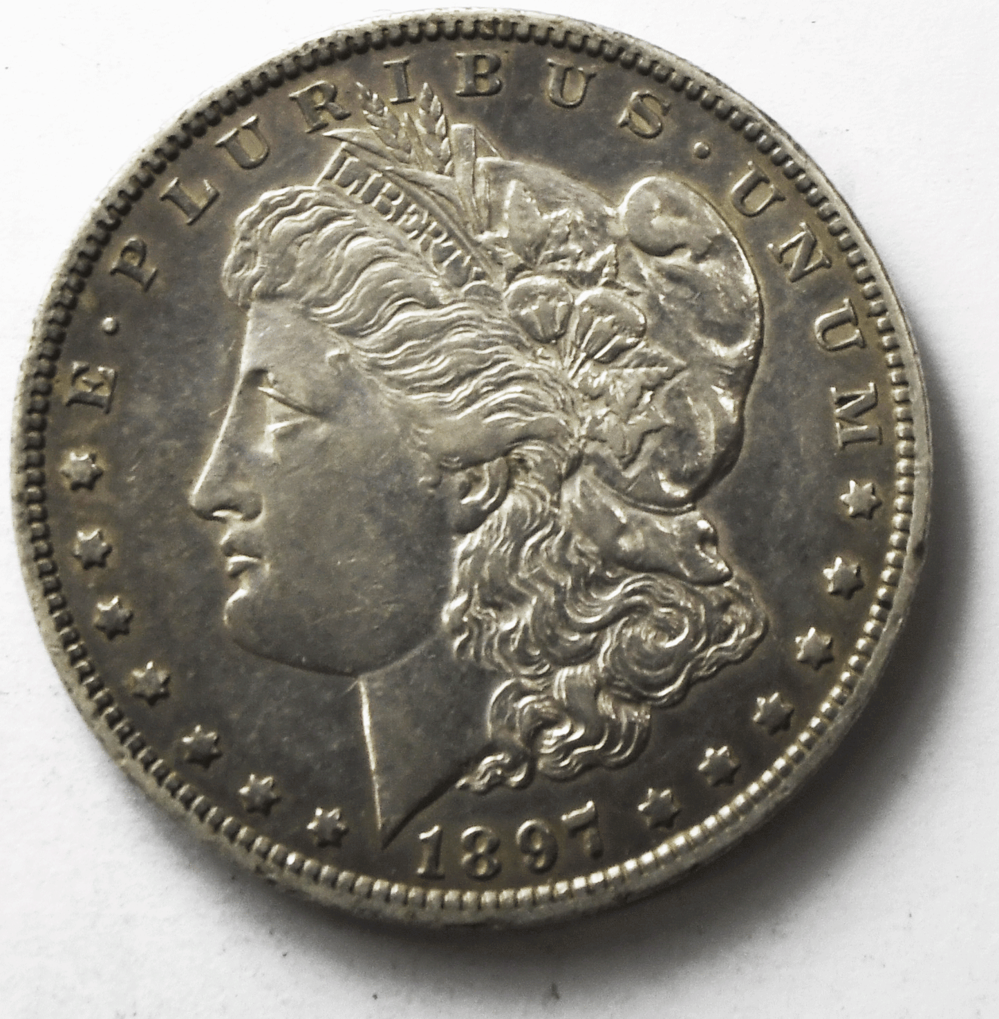1897 O $1 Morgan Silver One Dollar New Orleans AU